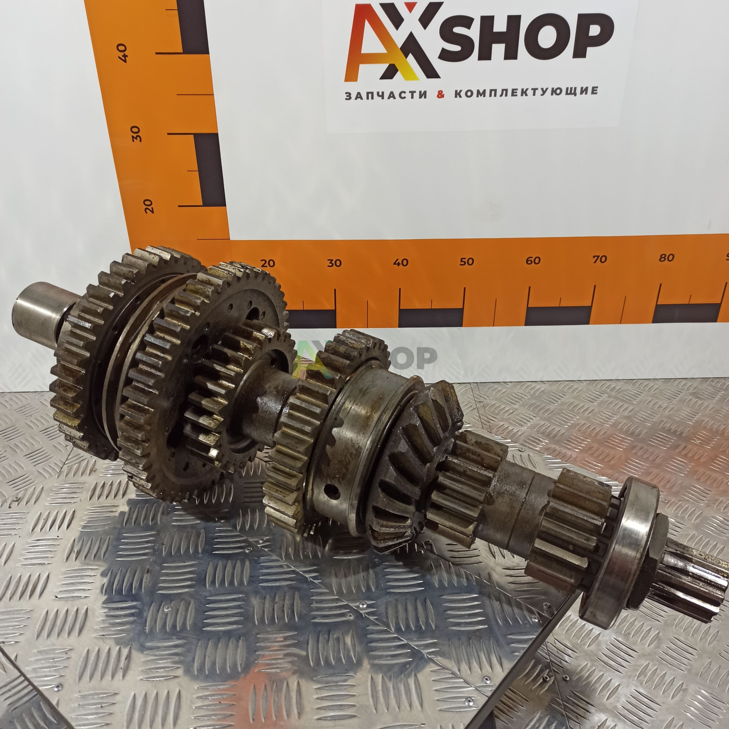 8.10.021 Вал передаточный с шестернями